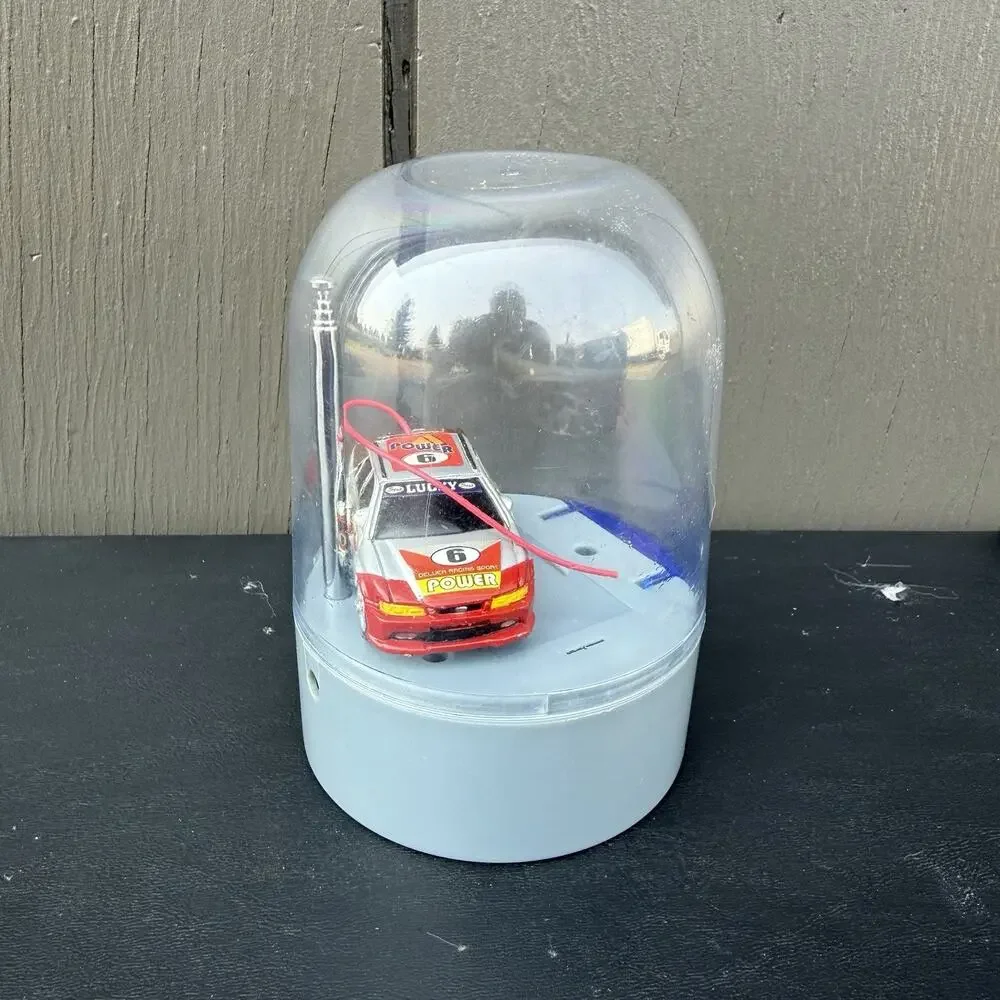 Vintage Remote Controlled Micro Car Mini Master racer. Charges And Works
